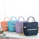 Sac isotherme souple violet avec bandoulière
