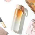 Gourde en verre design orange pour boissons