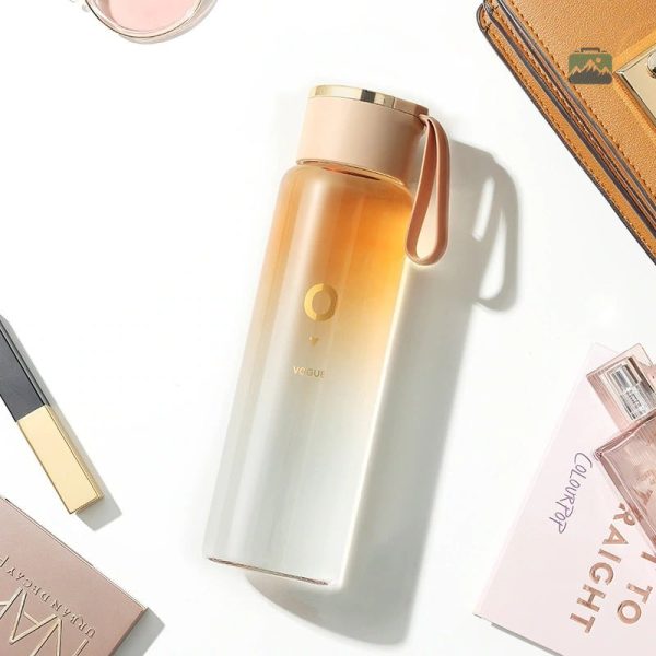 Gourde en verre design orange pour boissons