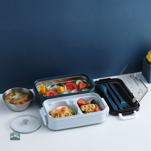 Boîte à lunch bleue avec plusieurs compartiments